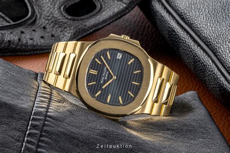 patek philippe nautilus gold.